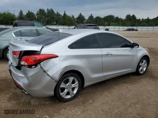 2013 Hyundai Elantra Coupe GS PZEV with VIN KMHDH6AE3DU005422, listed as a Copart auction lot 64999614 with 63,486 mi miles and Salvage Title. Bid and sale history available at carsss.com. Image 3.
