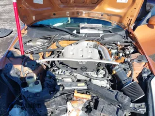 2004 Nissan 350Z Touring z VIN JN1AZ36A24T000472, wystawiony jako IAAI lot #38684053 z przebiegiem 65 769 mil mil oraz . Historia ofert i sprzedaży dostępna na DreamBid. Obrazek 10.