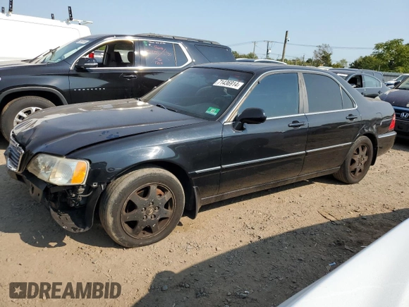 2002 Acura RL with VIN JH4KA96512C013028, listed as a Copart auction lot 71436914 with 142,527 mi miles and Salvage Title. Bid and sale history available at carsss.com. Image 1.