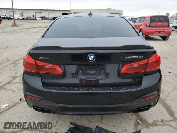 2018 BMW 5 Series M550i xDrive with VIN WBAJB9C56JB049524, listed as a Copart auction lot 43511805 with 55,759 mi miles and Salvage title. Bid and sale history available at DreamBid. Image 6.