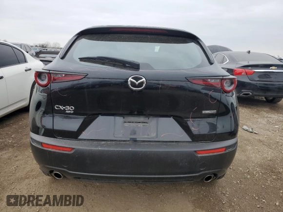 2023 Mazda CX-30 S with VIN 3MVDMBAM6PM549095, listed as a Copart auction lot 53027665 with 53,804 mi miles and Salvage title. Bid and sale history available at DreamBid. Image 6.