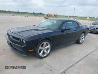 2012 Dodge Challenger SXT Plus z VIN 2C3CDYAG2CH281069, wystawiony jako IAAI lot #42314949 z przebiegiem 167 592 mil mil oraz . Historia ofert i sprzedaży dostępna na DreamBid. Obrazek 17.