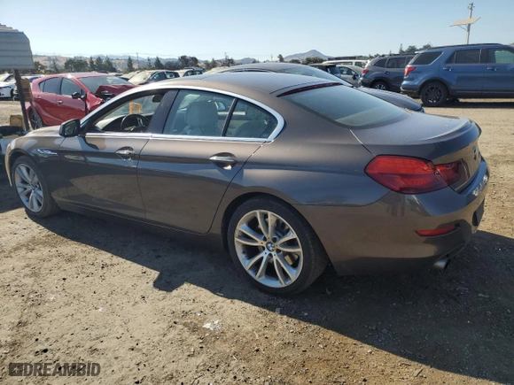 2013 BMW 6 Series 640i with VIN WBA6A0C53DDZ03673, listed as a Copart auction lot 68148144 with 102,703 mi miles and Salvage Title. Bid and sale history available at carsss.com. Image 2.