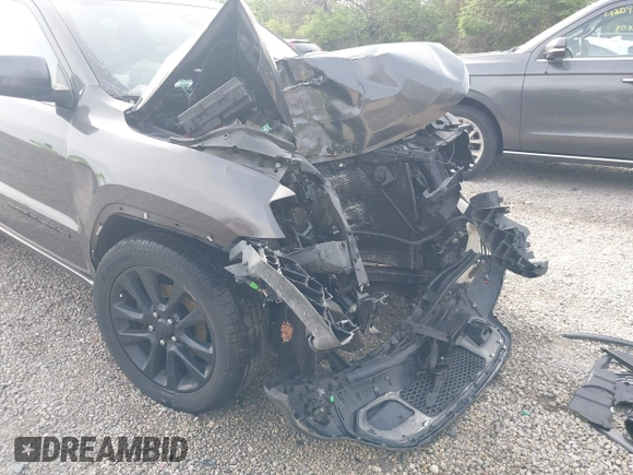 2018 Jeep Grand Cherokee Laredo E with VIN 1C4RJFAG0JC120383, listed as a IAAI auction lot 42115098 with Not Provided miles and . Bid and sale history available at DreamBid. Image 18.