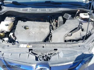 2009 Mazda Mazda5 Sport with VIN JM1CR293090344744, listed as a IAAI auction lot 42042896 with 215,303 mi miles. Bid and sale history available at carsss.com. Image 10.