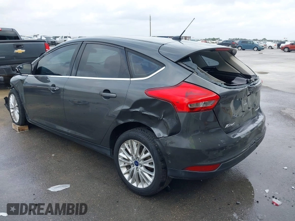 2017 Ford Focus Titanium with VIN 1FADP3N20HL210364, listed as a IAAI auction lot 42130643 with 132,312 mi miles and . Bid and sale history available at DreamBid. Image 3.