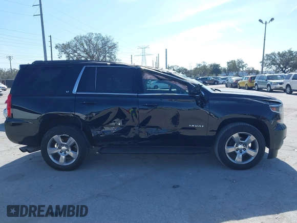 2018 Chevrolet Tahoe LT with VIN 1GNSCBKCXJR132867, listed as a IAAI auction lot 41456319 with 59,131 mi miles and . Bid and sale history available at DreamBid. Image 12.