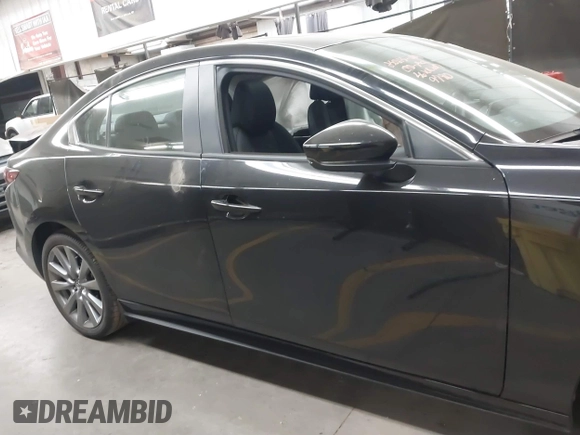 2023 Mazda 3 S Preferred with VIN 3MZBPACM5PM369790, listed as a IAAI auction lot 41612983 with 9,789 mi miles and . Bid and sale history available at DreamBid. Image 13.