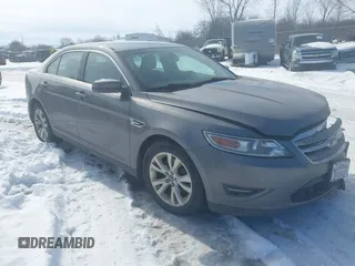 2012 Ford Taurus SEL z VIN 1FAHP2EW2CG134937, wystawiony jako IAAI lot #41622031 z przebiegiem 219 389 mil mil oraz . Historia ofert i sprzedaży dostępna na DreamBid. Obrazek 1.