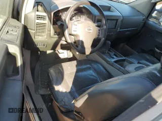 2004 Nissan Titan SE with VIN 1N6AA06AX4N580896, listed as a Copart auction lot 81741484 with 166,016 mi miles and Salvage Title. Bid and sale history available at carsss.com. Image 8.