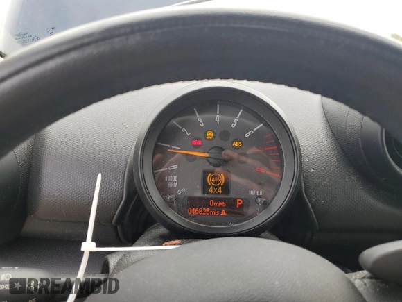 2015 MINI Countryman S with VIN WMWZC5C56FWP47995, listed as a Copart auction lot 55924945 with 46,825 mi miles and Salvage Title. Bid and sale history available at DreamBid. Image 9.