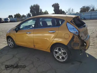 2011 Ford Fiesta SES with VIN 3FADP4FJ6BM124655, listed as a Copart auction lot 42670165 with 112,008 mi miles and Salvage Title. Bid and sale history available at carsss.com. Image 2.