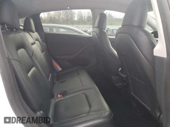 2023 Tesla Model Y Long Range with VIN 7SAYGDEE3PA130988, listed as a Copart auction lot 42172185 with 112,136 mi miles and Salvage Title. Bid and sale history available at DreamBid. Image 11.