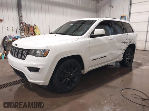 2018 Jeep Grand Cherokee Altitude with VIN 1C4RJFAG4JC280430, listed as a IAAI auction lot 41722164 with 91,183 mi miles and . Bid and sale history available at DreamBid. Image 2.