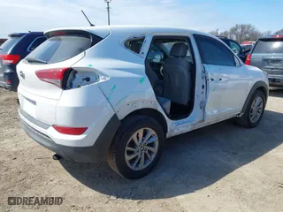 2018 Hyundai Tucson SE with VIN KM8J23A40JU669361, listed as a IAAI auction lot 41633583 with 97,884 mi miles. Bid and sale history available at carsss.com. Image 4.