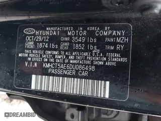 2013 Hyundai Accent GL with VIN KMHCT5AE6DU086498, listed as a IAAI auction lot 41966814 with 139,264 mi miles. Bid and sale history available at carsss.com. Image 9.