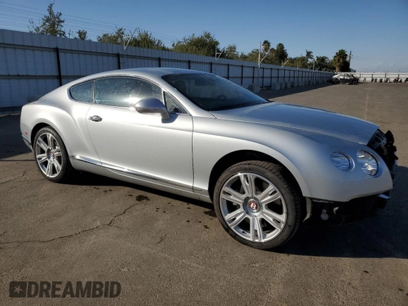 2013 Bentley Continental GT with VIN SCBFT7ZA1DC085265, listed as a Copart auction lot 76097134 with 14,756 mi miles and Salvage Title. Bid and sale history available at DreamBid. Image 4.