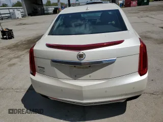 2014 Cadillac XTS Luxury z VIN 2G61M5S33E9193905, wystawiony jako Copart lot #55479605 z przebiegiem 143 006 mil mil oraz Szkoda całkowita • Salvage title. Historia ofert i sprzedaży dostępna na DreamBid. Obrazek 6.