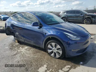 2022 Tesla Model Y Long Range with VIN 7SAYGAEE2NF390507, listed as a Copart auction lot 50986965 with 48,027 mi miles and Non Repairable. Bid and sale history available at DreamBid. Image 4.