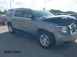 2020 Chevrolet Suburban LT z VIN 1GNSCHKC8LR157188, wystawiony jako IAAI lot #41578614 z przebiegiem 82 566 mil mil oraz . Historia ofert i sprzedaży dostępna na DreamBid. Obrazek 1.