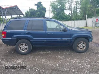 2000 Jeep Grand Cherokee Limited with VIN 1J4GW58S9YC347699, listed as a IAAI auction lot 42545373 with 118,566 mi miles and . Bid and sale history available at DreamBid. Image 14.