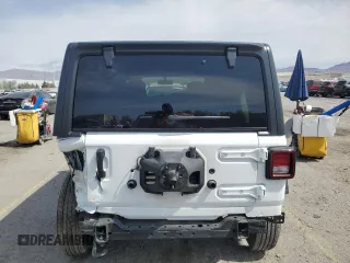 2021 Jeep Wrangler Unlimited Sport S with VIN 1C4HJXDG1MW815830, listed as a Copart auction lot 50634965 with 39,387 mi miles and Salvage title. Bid and sale history available at DreamBid. Image 6.