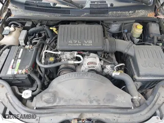 1999 Jeep Grand Cherokee Limited with VIN 1J4GW68N5XC684157, listed as a IAAI auction lot 42104283 with 164,506 mi miles. Bid and sale history available at carsss.com. Image 10.