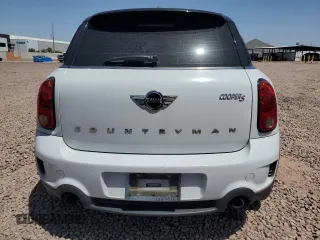 2016 MINI Countryman S with VIN WMWZC3C58GWT09694, listed as a Copart auction lot 57113235 with 126,082 mi miles and Salvage title. Bid and sale history available at DreamBid. Image 6.