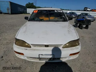 1996 Toyota Camry DX with VIN JT2BG12K7T0351784, listed as a Copart auction lot 52815345 with 303,537 mi miles and Clean Title. Bid and sale history available at carsss.com. Image 5.