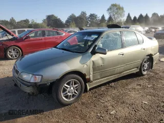 2002 Infiniti G20 Luxury with VIN JNKCP11AX2T509549, listed as a Copart auction lot 74531114 with 158,364 mi miles and Salvage Title. Bid and sale history available at DreamBid. Image 1.