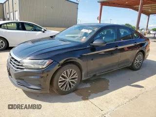 2020 Volkswagen Jetta S z VIN 3VWC57BU2LM095361, wystawiony jako Copart lot #58399475 z przebiegiem 91 828 mil mil oraz Czysty tytuł • Clean title. Historia ofert i sprzedaży dostępna na DreamBid. Obrazek 1.