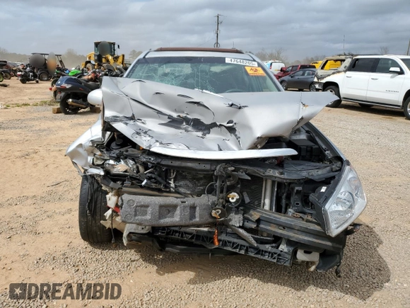 2005 Kia Spectra LX with VIN KNAFE121255202207, listed as a Copart auction lot 47648205 with 0 mi miles and Salvage Title. Bid and sale history available at carsss.com. Image 5.