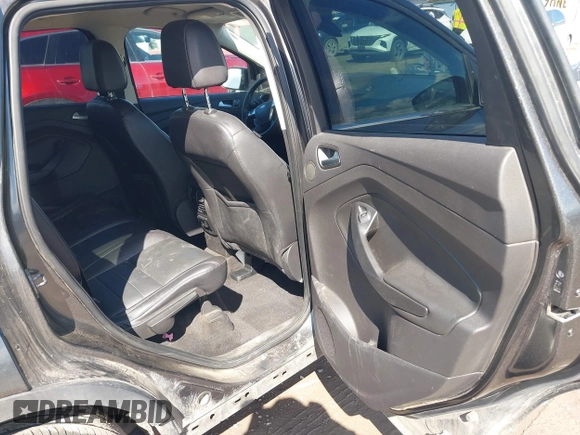 2016 Ford Escape Titanium with VIN 1FMCU9J96GUB96009, listed as a IAAI auction lot 41866127 with 132,990 mi miles and . Bid and sale history available at DreamBid. Image 8.