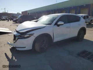 2020 Mazda CX-5 Touring with VIN JM3KFACM0L0770254, listed as a Copart auction lot 71066824 with 0 mi miles and Salvage Title. Bid and sale history available at carsss.com. Image 1.