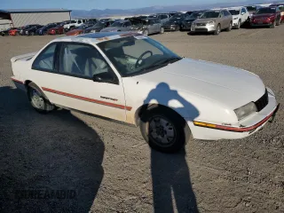 1990 Chevrolet Beretta z VIN 1G1LW14T1LE136918, wystawiony jako Copart lot #72023874 z przebiegiem 71 009 mil mil oraz Czysty tytuł • Clean title. Historia ofert i sprzedaży dostępna na DreamBid. Obrazek 4.