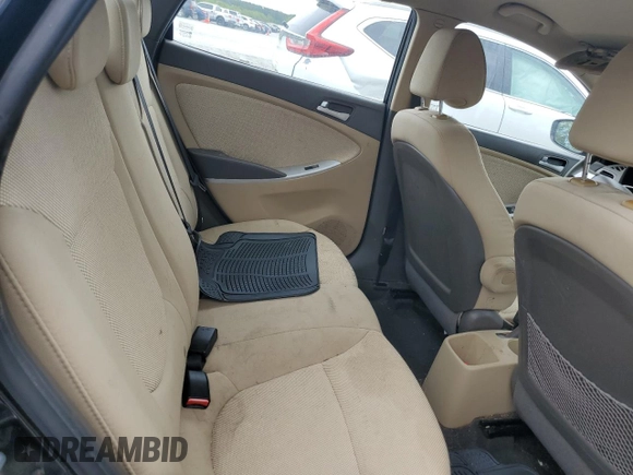 2012 Hyundai Accent GLS z VIN KMHCT4AEXCU041024, wystawiony jako Copart lot #54057455 z przebiegiem 219 530 mil mil oraz Szkody całkowita. Historia ofert i sprzedaży dostępna na DreamBid. Obrazek 10.
