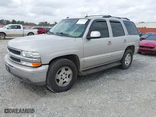 2004 Chevrolet Tahoe LT with VIN 1GNEC13Z74R137135, listed as a IAAI auction lot 41805414 with 249,326 mi miles. Bid and sale history available at carsss.com. Image 2.