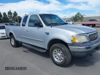 2001 Ford F-150 XL with VIN 1FTRX18L91KF29881, listed as a IAAI auction lot 42021554 with 199,041 mi miles. Bid and sale history available at carsss.com. Image 1.