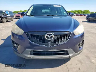 2013 Mazda CX-5 Touring with VIN JM3KE4CEXD0143205, listed as a Copart auction lot 54143235 with 258,715 mi miles and Clean Title. Bid and sale history available at carsss.com. Image 5.