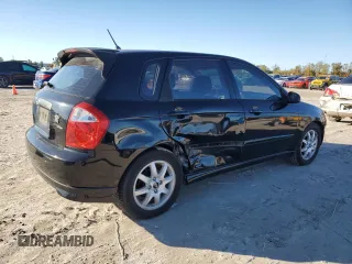 2005 Kia Spectra with VIN KNAFE161355073968, listed as a Copart auction lot 84543784 with 166,858 mi miles and Salvage Title. Bid and sale history available at carsss.com. Image 3.