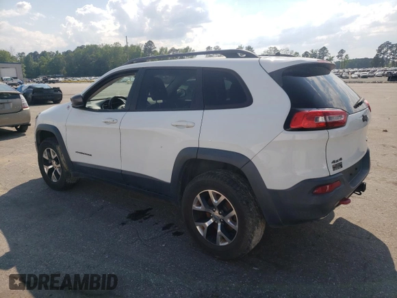 2014 Jeep Cherokee Trailhawk with VIN 1C4PJMBS5EW185510, listed as a Copart auction lot 55780005 with 130,358 mi miles and Clean title. Bid and sale history available at DreamBid. Image 2.