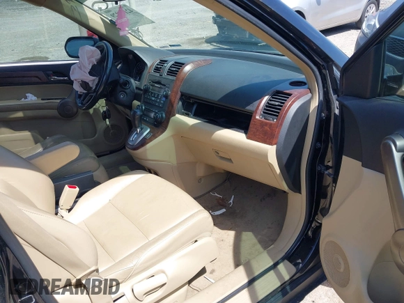 2009 Honda CR-V EX-L with VIN 5J6RE48799L068756, listed as a IAAI auction lot 42142229 with 198,920 mi miles and . Bid and sale history available at carsss.com. Image 5.