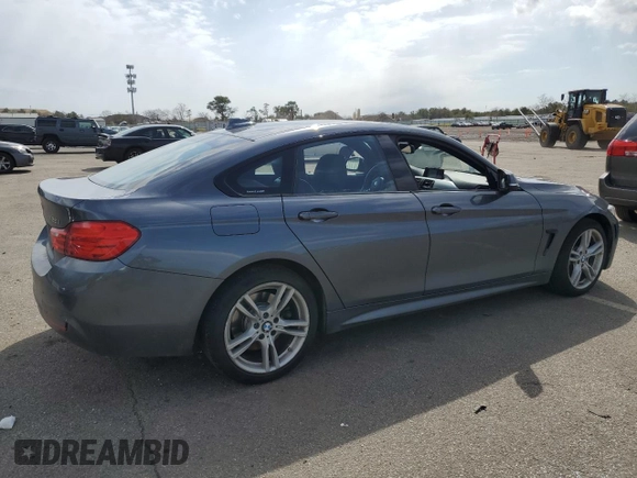 2016 BMW 4 Series 428i xDrive with VIN WBA4C9C50GG137720, listed as a Copart auction lot 50240545 with 60,705 mi miles and Salvage Title. Bid and sale history available at DreamBid. Image 3.