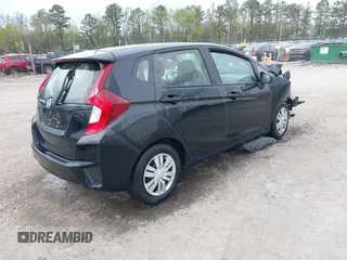 2016 Honda Fit LX with VIN JHMGK5H5XGX019435, listed as a IAAI auction lot 42009756 with 71,757 mi miles and . Bid and sale history available at DreamBid. Image 4.