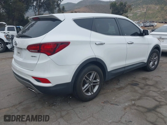 2018 Hyundai Santa Fe Sport 2.4L with VIN 5XYZT3LB0JG562814, listed as a IAAI auction lot 42047560 with 113,543 mi miles. Bid and sale history available at carsss.com. Image 4.