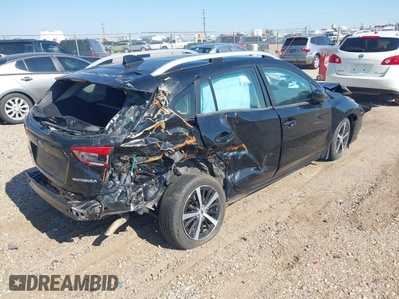 2020 Subaru Impreza Premium with VIN 4S3GTAD67L3712955, listed as a IAAI auction lot 42668679 with 69,300 mi miles and . Bid and sale history available at DreamBid. Image 4.