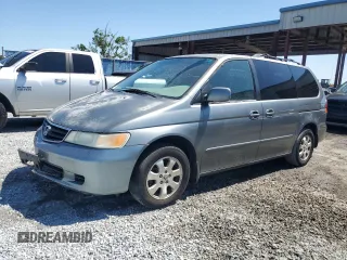 2002 Honda Odyssey EX z VIN 2HKRL18622H501703, wystawiony jako Copart lot #53851755 z przebiegiem 207 977 mil mil oraz Szkoda całkowita • Salvage title. Historia ofert i sprzedaży dostępna na DreamBid. Obrazek 1.