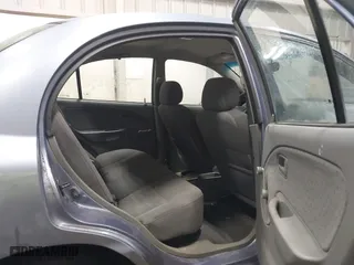 2003 Kia Rio with VIN KNADC125536274171, listed as a IAAI auction lot 41986369 with 59,837 mi miles. Bid and sale history available at carsss.com. Image 8.