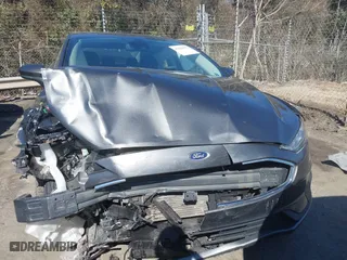 2019 Ford Fusion Hybrid SE with VIN 3FA6P0LU1KR235021, listed as a IAAI auction lot 41660786 with 93,331 mi miles. Bid and sale history available at carsss.com. Image 12.