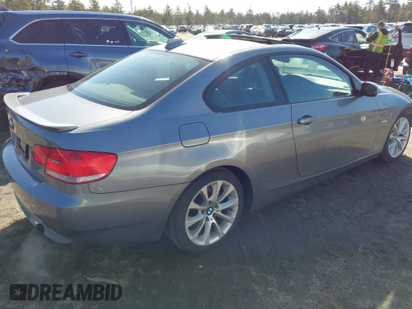 2009 BMW 3 Series 335i xDrive with VIN WBAWC73519E269820, listed as a IAAI auction lot 41794929 with 122,691 mi miles. Bid and sale history available at carsss.com. Image 4.